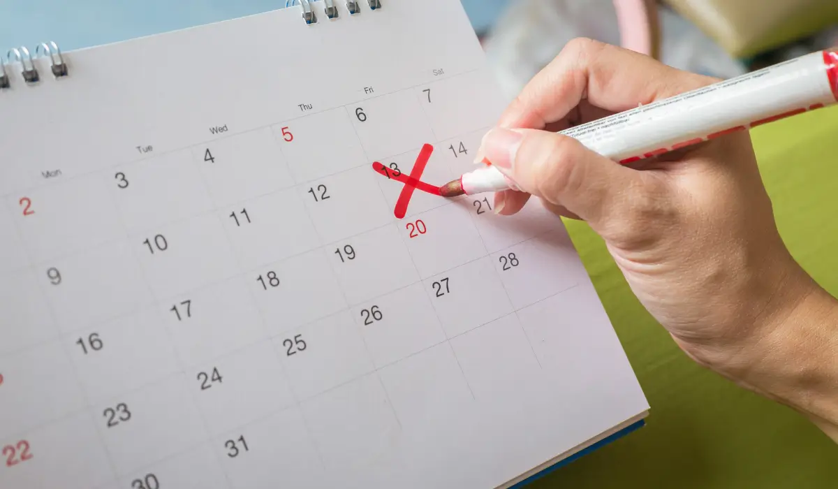 Calendar with red mark highlighting Illinois Restricted Permit processing and activation waiting period.